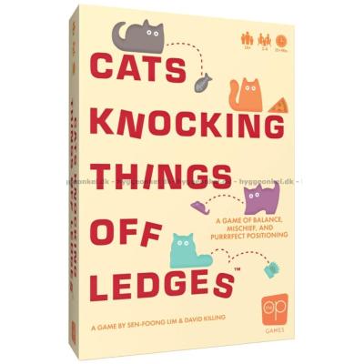 Bilde av Cats Knocking Things Off Ledges sett skrått ovenfra